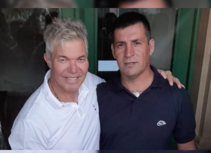 Fernando Burlando junto a Luis Cisneros. 